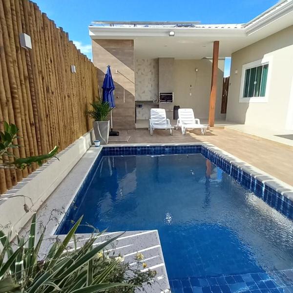 Casa em condomínio com área Gourmet, piscina e garagem - Foto 4