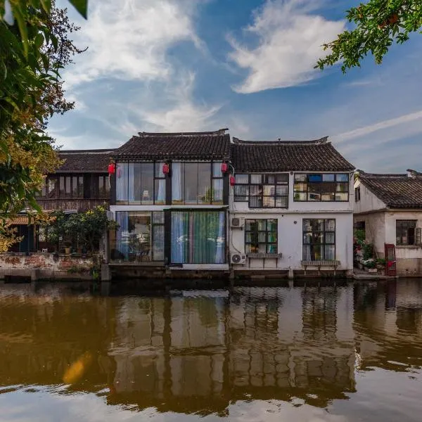 Tongli Slowlife River View Inn, hótel í Suzhou