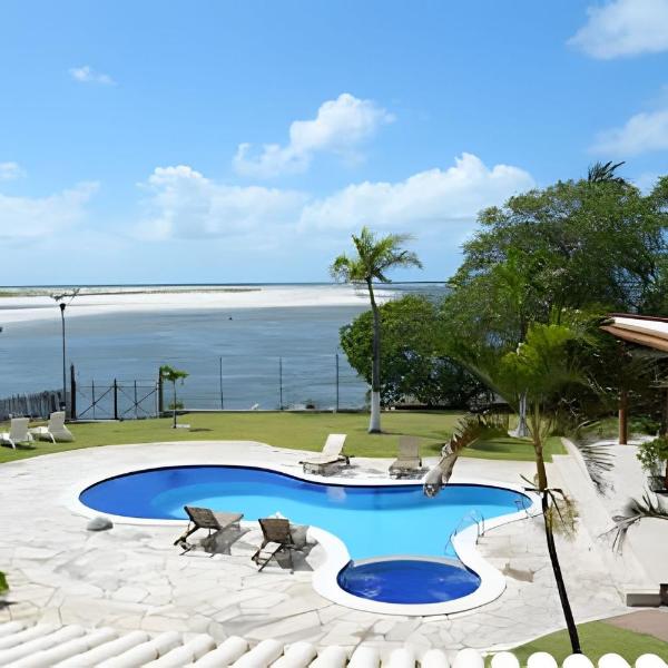 Casa Bruma |Pé na areia, encontro do rio com o mar