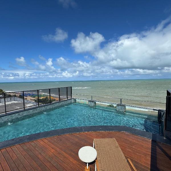 Flat beira-mar pé na areia com varanda