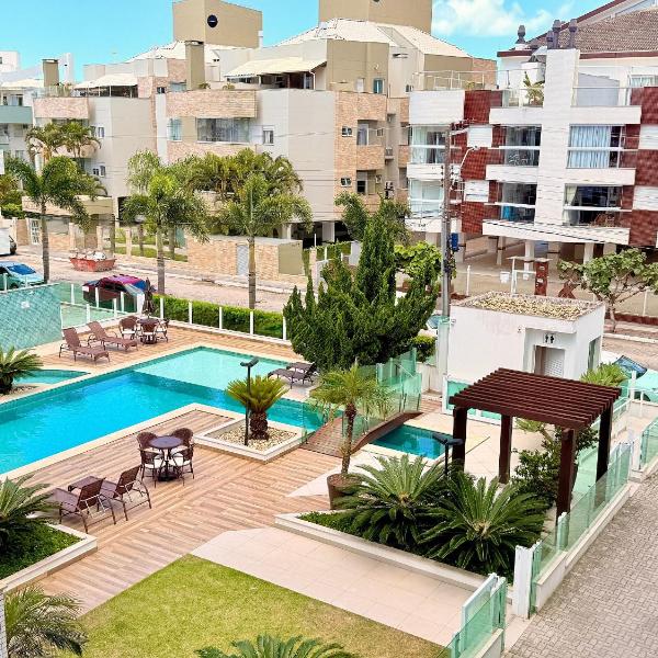 Vista agradável da piscina em apartamento iluminado a 500 metros da praia - Foto 4