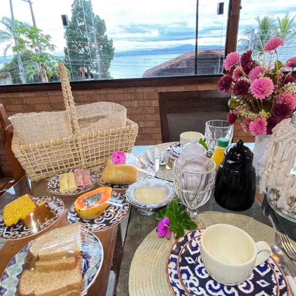 Apartamento com churrasqueira, ar condicionado e vista para o mar localização espetacular