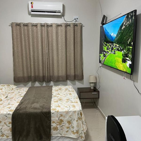 Casa com suite bem localizada