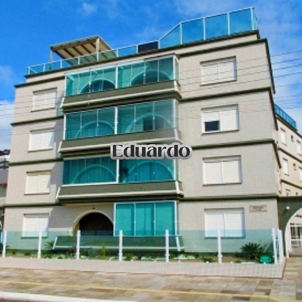 Apartamento pé na areia no centro de Tramandaí!