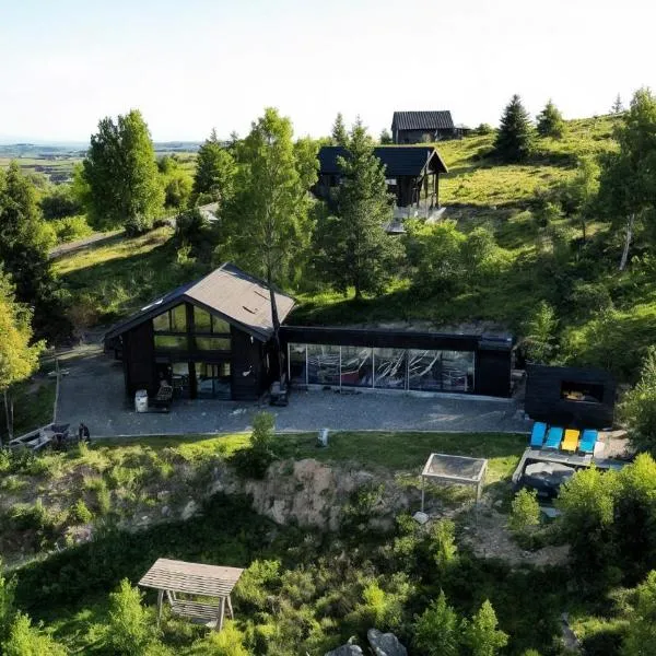 Casa de Jos - Pe Dealul Mieilor - Cabană cu Jacuzzi și Saună în Măguri、Măguriのホテル