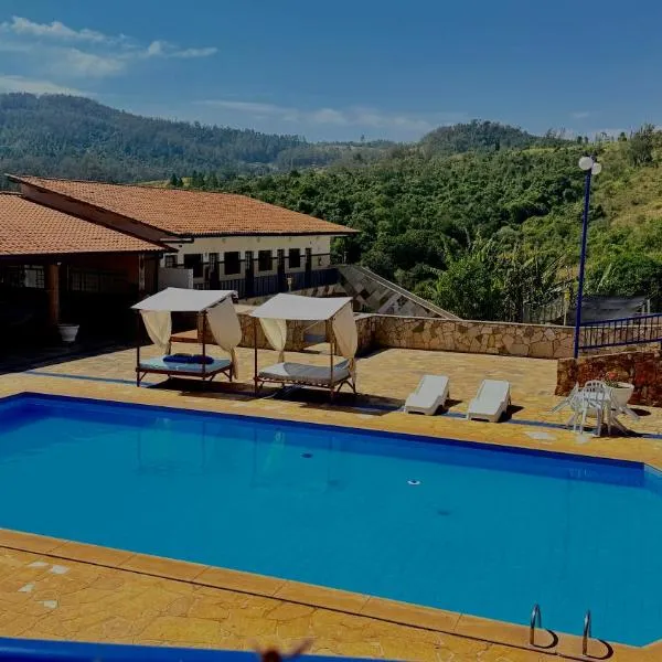 Nova Aliança Suítes por Temporada em Amparo NÃO SOMOS POUSADA, hotel in Amparo