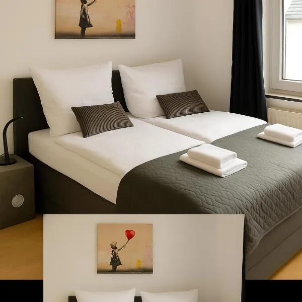 AMA Home AMALI - Geräumiges Apartment mit Balkon & Parkplatz - Perfekt für Business & Erholung, hotel em Hiddenhausen