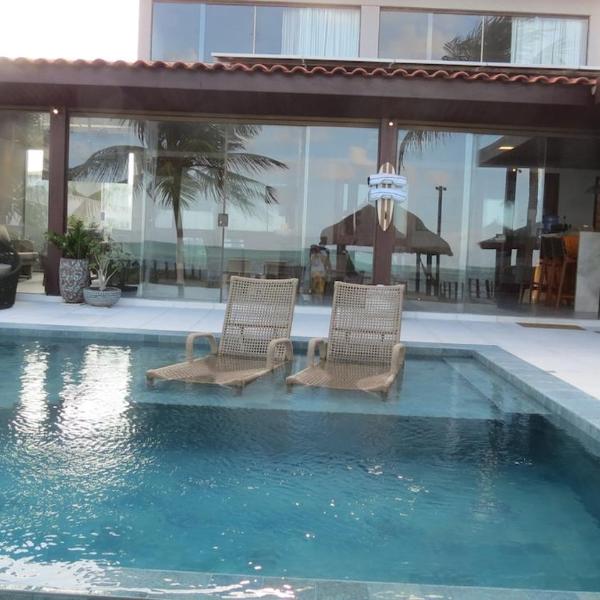 Casa espaçosa, luxuosa, beirar mar, proxima a carneiros, 6 suites