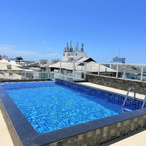 Residencial com piscina de borda infinita a poucos passos da praia e próxima à sorveteria - Foto 4
