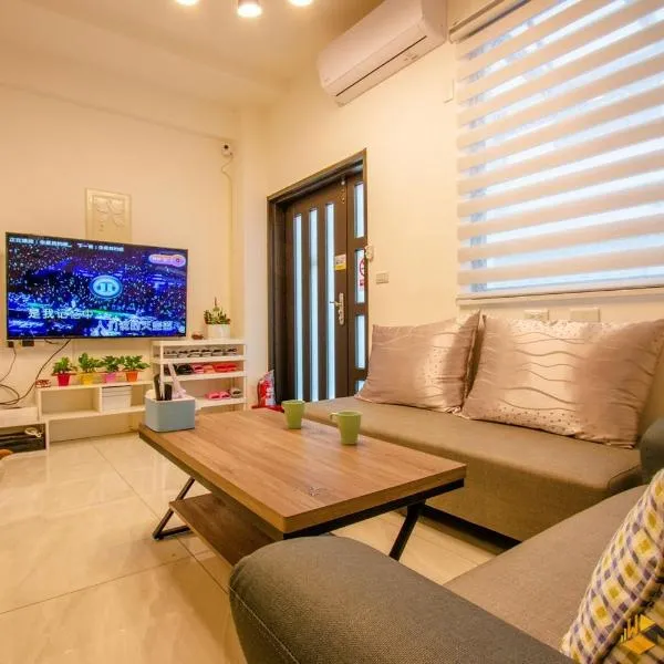 Herland Homestay, hotell i Wanfu