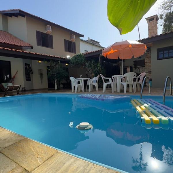 Aconchego e diversão em Peruíbe sobrado com estrutura completa para sua família ar condicionado, churrasqueira ,academia, cervejeira, piscina - Foto 4