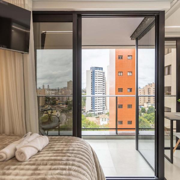 Varanda panorâmica | Suíte Comfort Batel