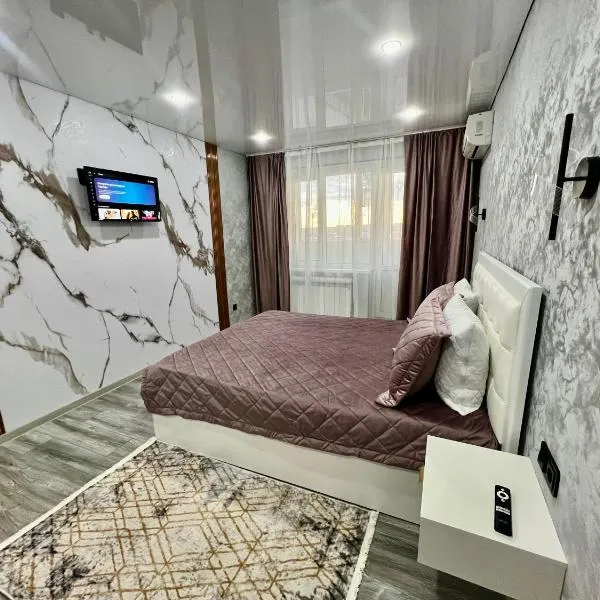 Элитная квартира возле керуен сити , 11 мкр, hotel in Aktobe