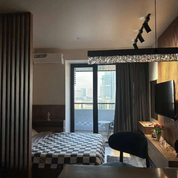 Люкс апартаменты в NRG U-TOWER с видом на город, hotel a Taixkent