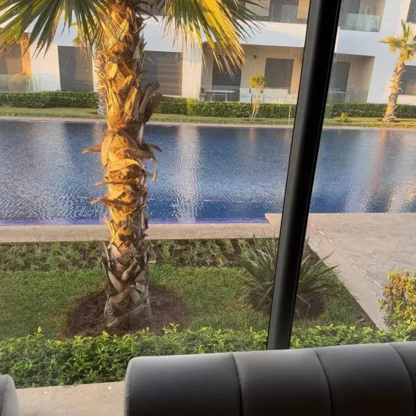 Superbe appartement 120 mc, Plage à pieds, 3 piscines & calme garanti - Sidi Rahal Plage, hotel a Sidi Rahal