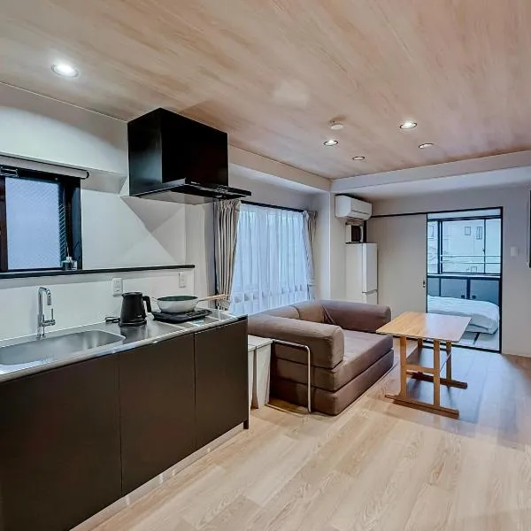 AURA YUZAWA Apartment Hotel - 1Bedroom Apartment with Living Dining Kitchen Sleeps 2 to 4, Bedroom with 2-Double Bed, Living Room with 1-Sofa Bed, hotel in Yuzawa