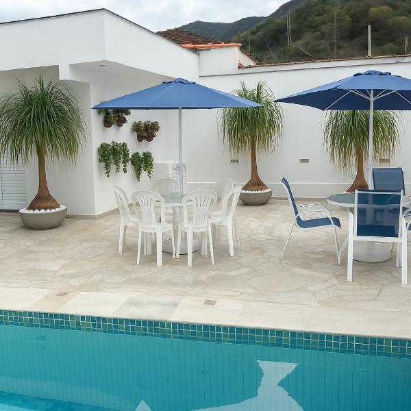 Casa Espaçosa com 5 Quartos Piscina Privativa 300m da Praia Ar condicionado em todos cômodos