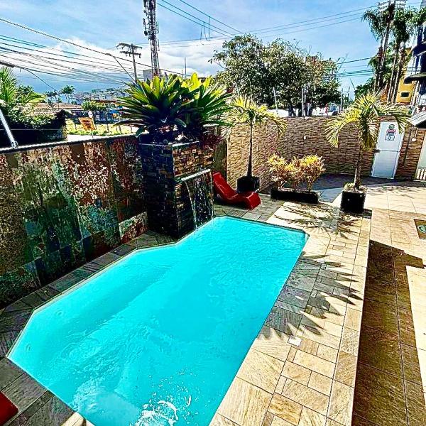 Casa Pé na Areia com Piscina Climatizada