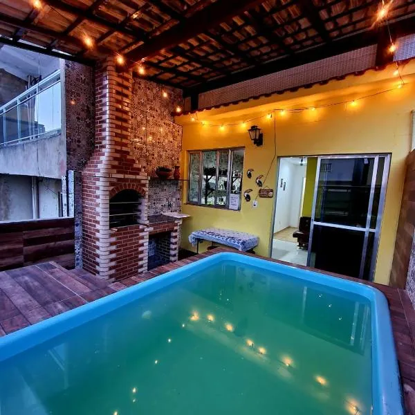 Cantinho Feliz de Muriqui / Casa amarela, hotel in Mangaratiba