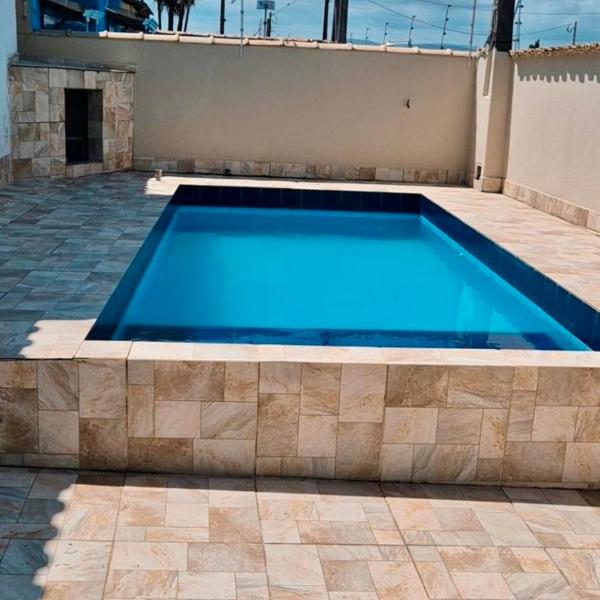 Casa temporada com piscina 600 metros da praia