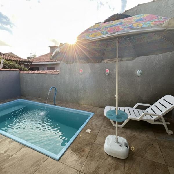 Casa com Piscina no Centro