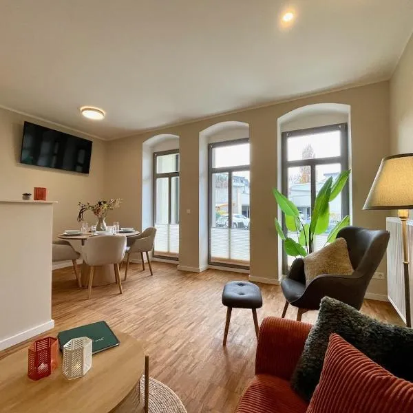 ApartmentRosa12 - das Tor zur Sächsischen Schweiz! Neu, zentral mit Parkplatz und Terrasse!, отель в Пирне