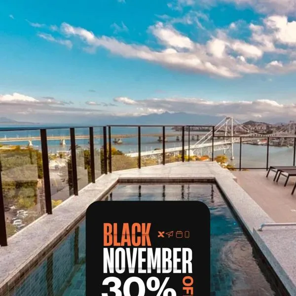 The Bridge by Xtay -Estúdios em Floripa com Piscina no Rooftop e Academia Completa, e fácil acesso as Praias Populares，位于弗洛里亚诺波利斯的酒店