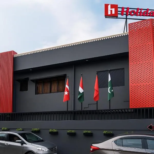 Holiday One Hotel & Suites: Karaçi şehrinde bir otel