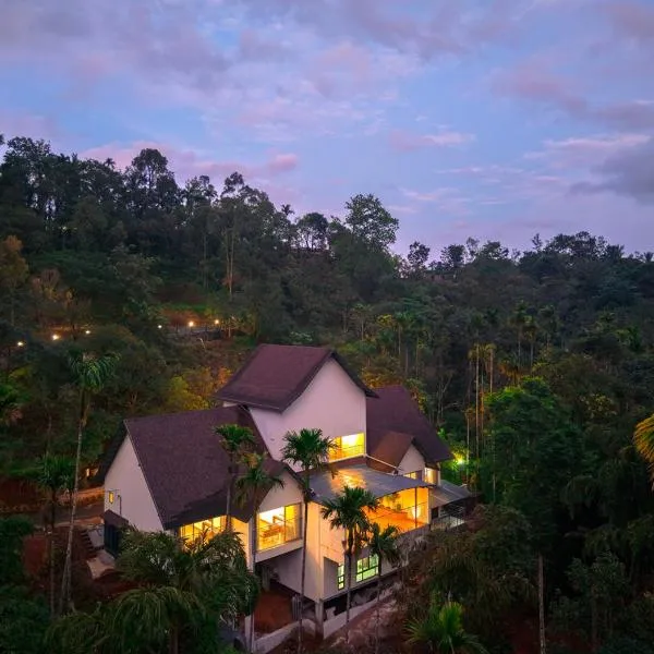 Achutham Cottages Wayanad by VOYE HOMES, hotel en Padinjarathara