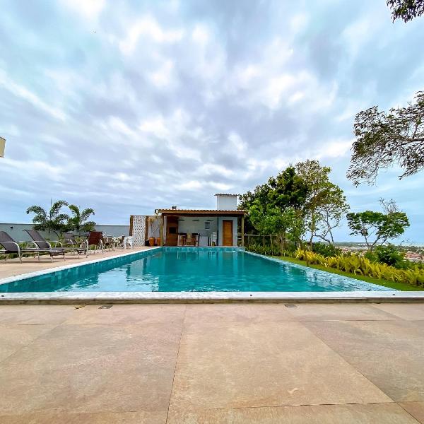 Casa duplex com 3 quartos, sendo 2 suítes a aproximadamente 1200m da praia de Taperapuã, condomínio com vista espetacular para o mar. - Foto 4