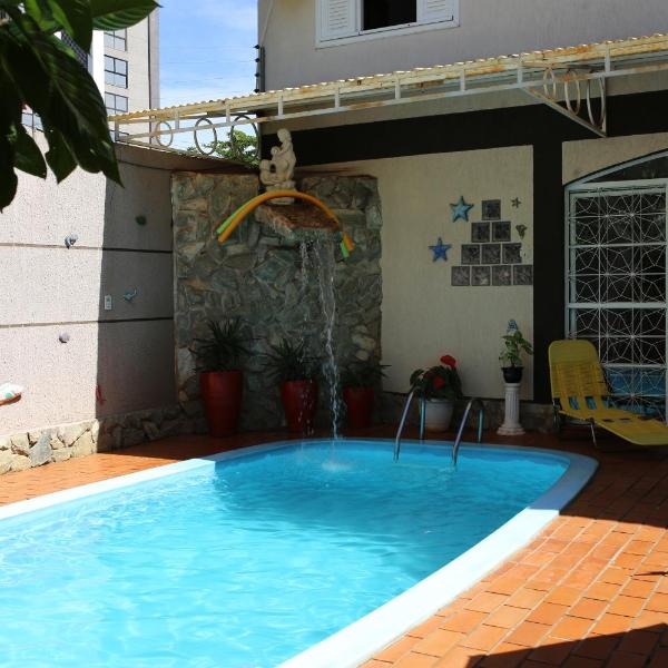 Casa com PISCINA no CENTRO - Estacionamento PRIVATIVO - 650m do Shopping JL - Foto 4