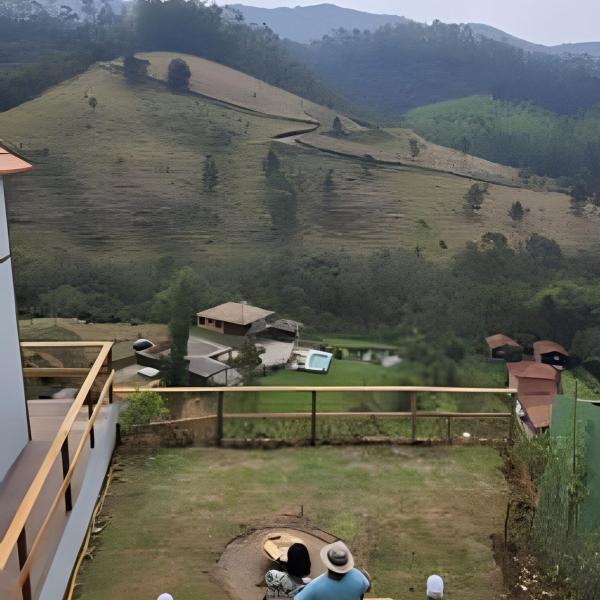 Chalé com bela vista para as montanhas