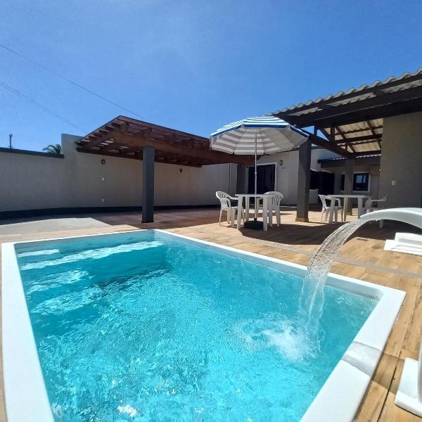 Casa com piscina, Ar condicionado, Pertinho Do Mar Em Capão Da Canoa