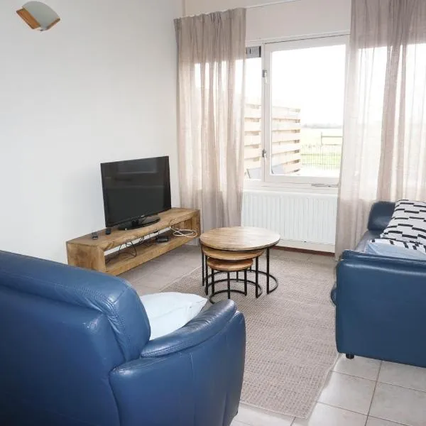 Viesnīca Kustverhuur, Oude manege Nieuwvliet, Nieuwvliet 11 pilsētā Nīvvlīte