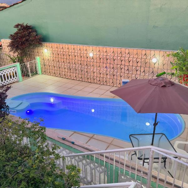 Casa com piscina na praia das palmeiras
