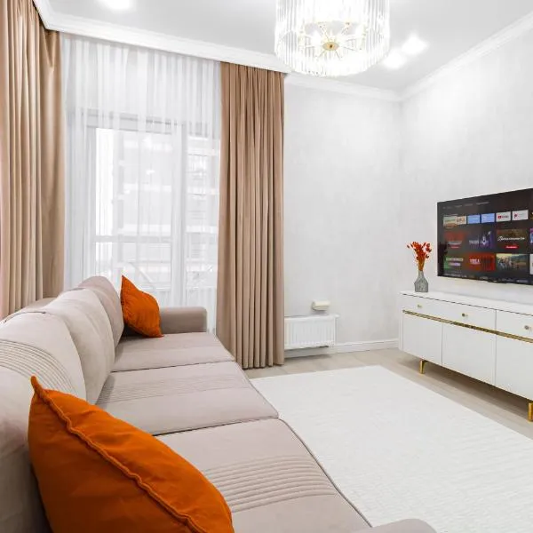 Уютные апартаменты Nexpo City, hotel in Astana
