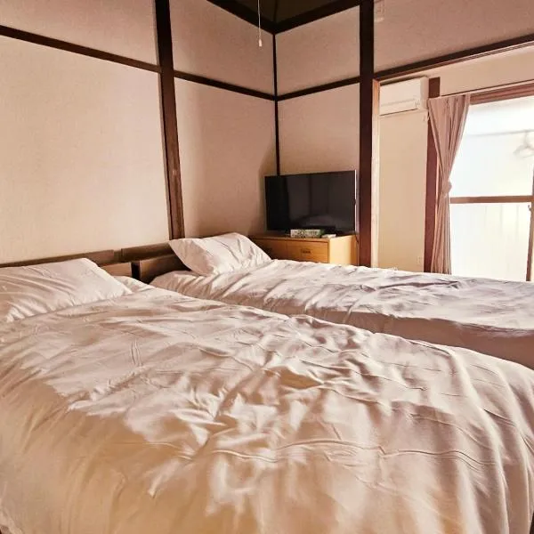 AnHome聖天下弐号館駅徒歩10分関西空港直通難波心斎橋近最大4人, hotel u Osaki