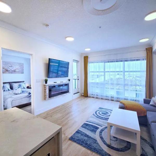 Calgary में, होटल Family Modern 1BR and Den Condo - Apartment with City View, Downtown, Balcony, Free Parking & In-Suite Laundry!