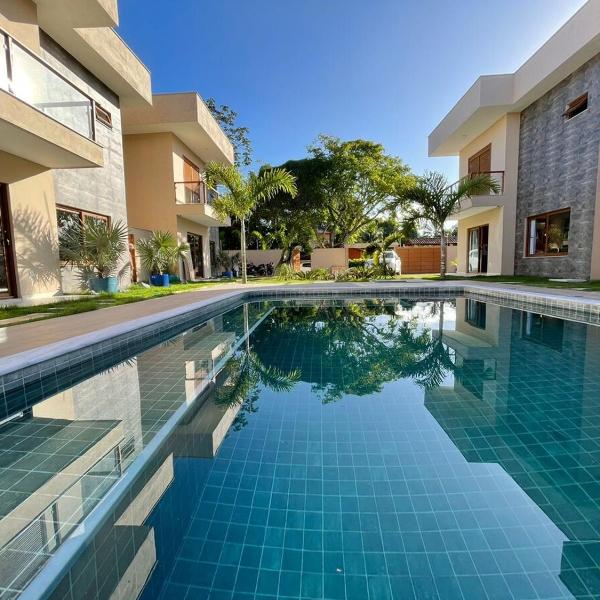 Casa nova em condominio com 4 suites spa e academia