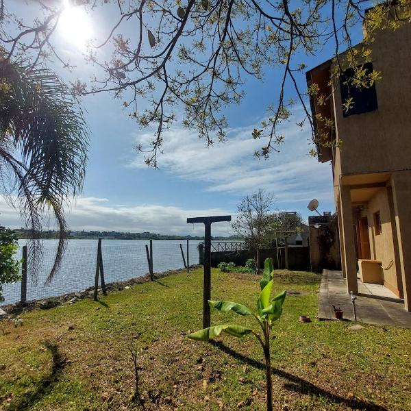 Casa Encanto da Lagoa com acesso à lagoa e pátio cercado