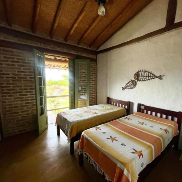 Casa rústica e charmosa em condomínio - Lagoinha - Foto 2