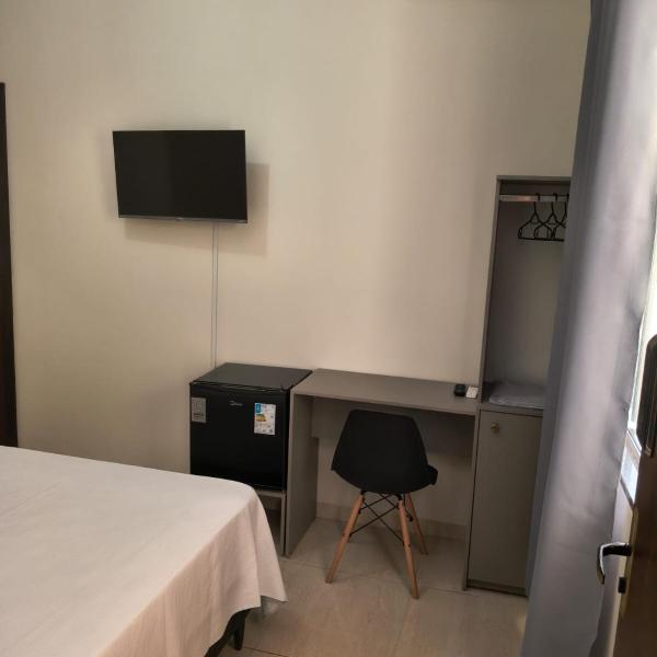 suíte para 3 pessoas com ar,tv e frigobar garagem para veículo de pequeno porte - Foto 3
