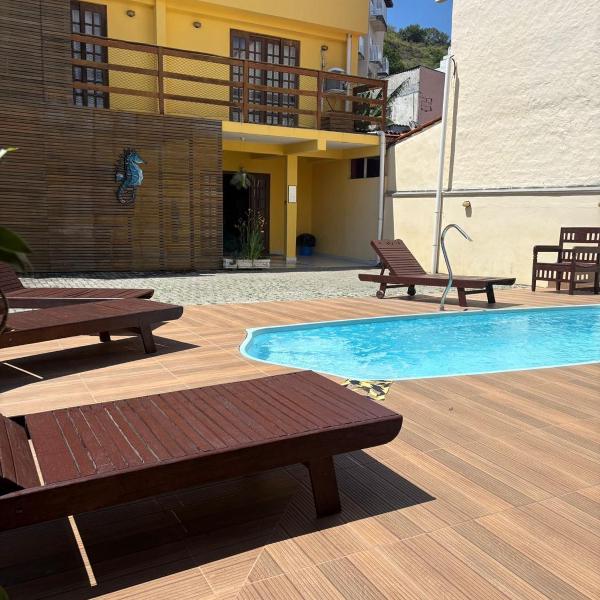 03 Apartamento de praia com ótima localização e piscina