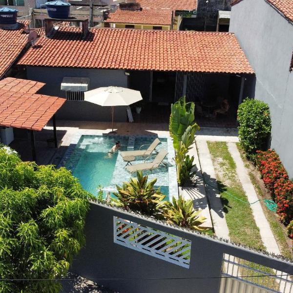 Casa de Praia: 4 Quartos, 3 Suítes, Próximo a Praia