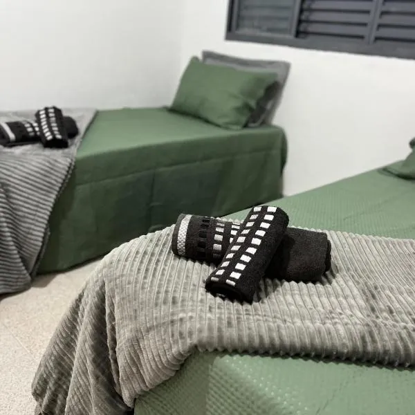 Acolhedora casa de 03 quartos, hotel em Passos