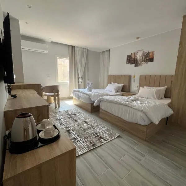 Saloumy pyramids hotel, ξενοδοχείο σε Nazlat as Sammān