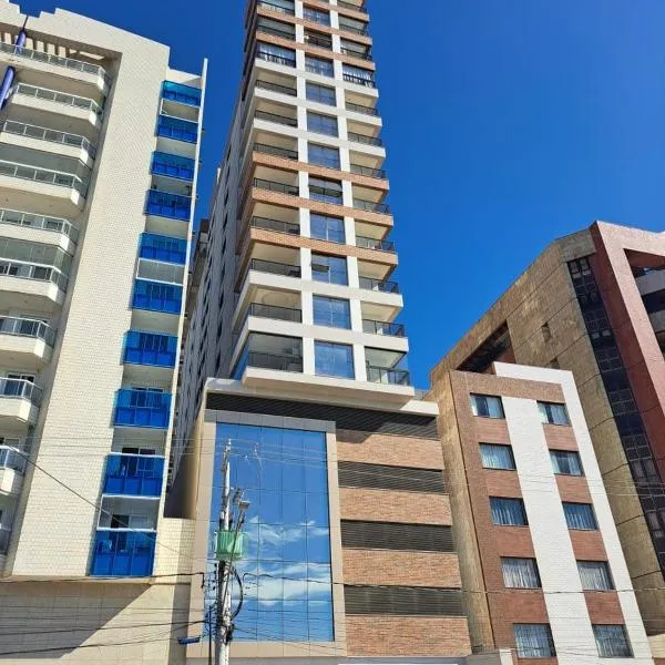 Guarapari- praia do Morro- apto PE NA AREIA com vista para mar loalizacao privilegiada em frente o quiosque 19 Beira Mar Wi Fi, hótel í Guarapari