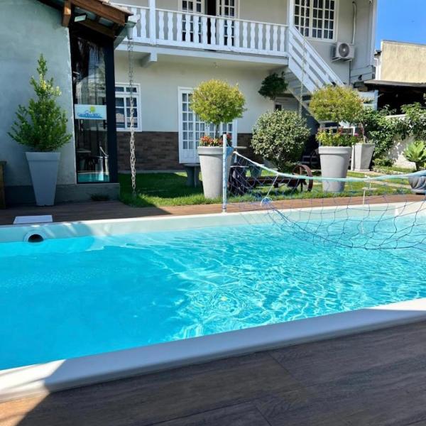 Casa com piscina Aquecida Balneário Camboriú CasaAlbertiBc