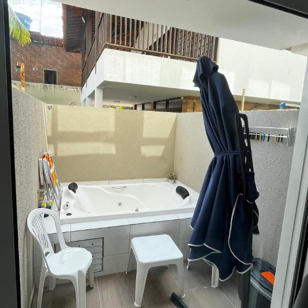 Flat com Hidromassagem Privativa e Piscina no Rooftop no Centro de Porto