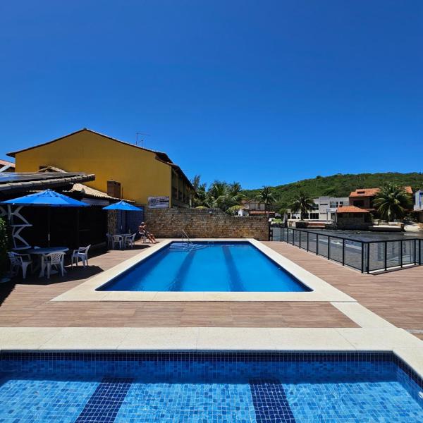 2 quartos com ar condicionado, piscina, sauna e churrasqueira
